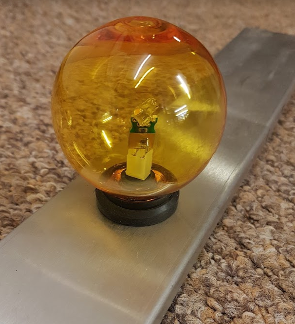 Bush in use with globe shield