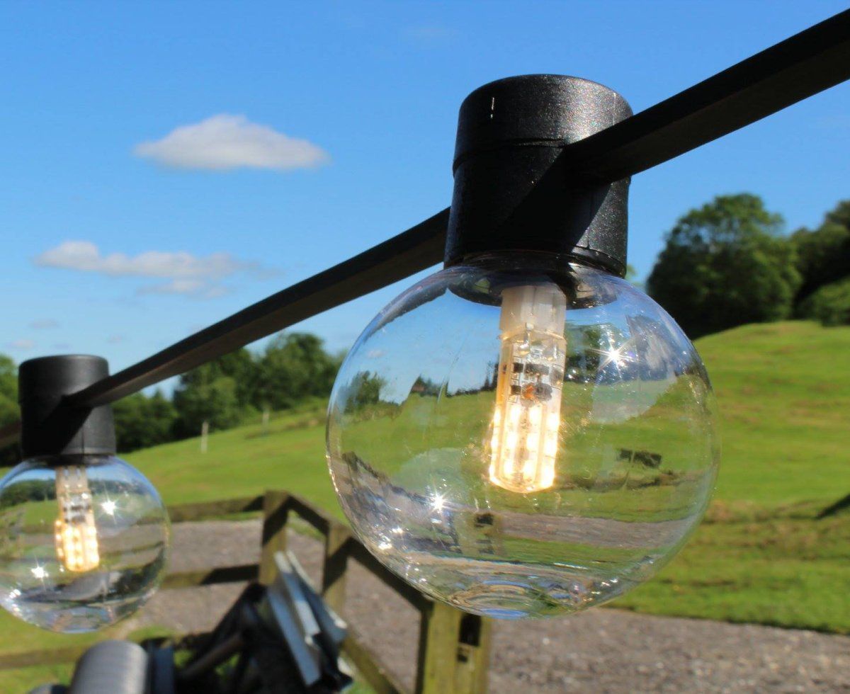 Close-up of a festoon LED lightbulb outside