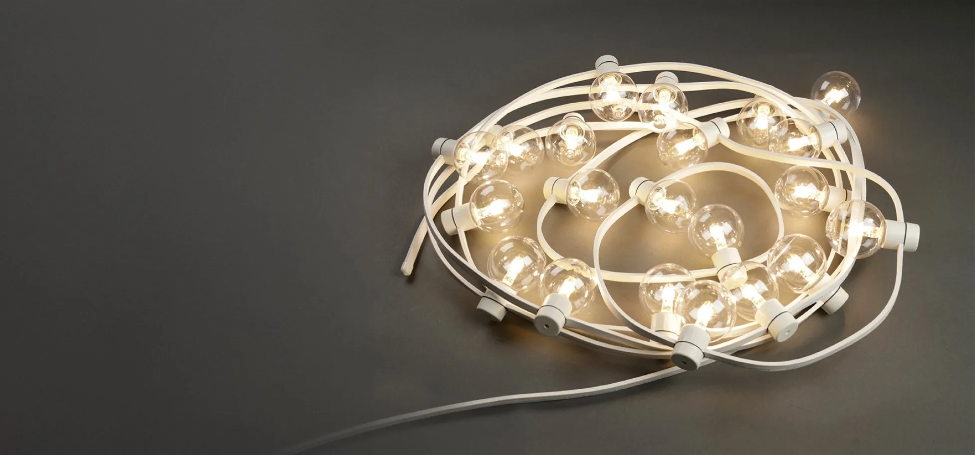 Coiled warm LED festoon lights